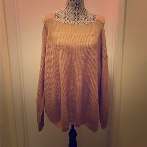 Knitted top with peek a boo shoulder